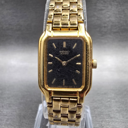 Seiko Watch Women 17mm Black Dial Gold Tone Rectangle Y400-5498 New Battery JP230