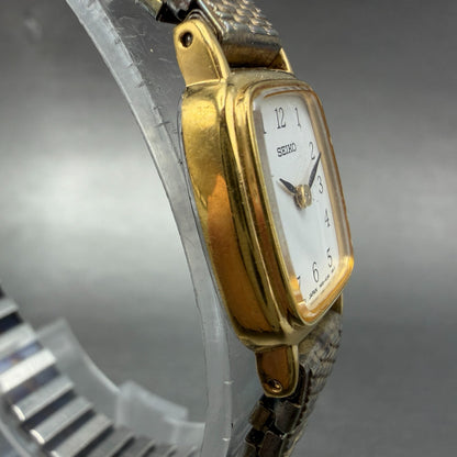 Seiko Tank Watch Women 18mm White Dial Gold Tone Rectangle 1N00-5K29 New Bat3