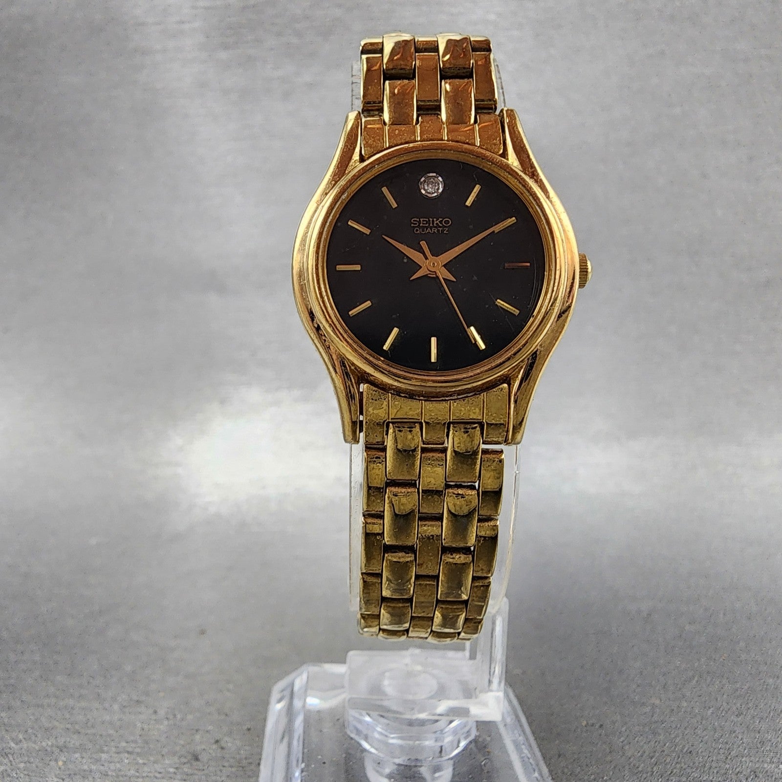 Seiko watch Women 24mm Black Dial Gold Tone Round V4011600 New Battery5