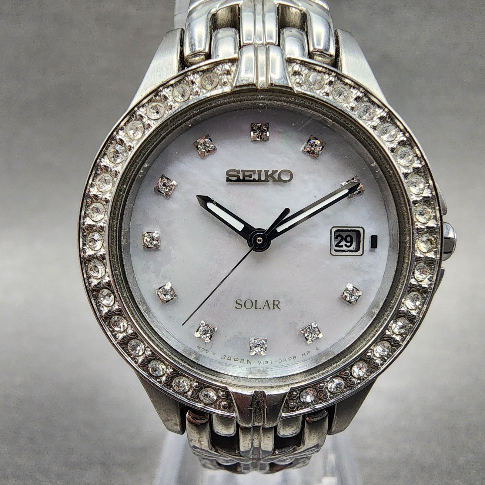 Seiko Solar Watch Women 27mm MOP Dial Steel Date Round Crystal Bezel Runs1