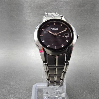 Citizen Eco-Drive Watch Women 26mm Black Dial Silver Tone Date E011-S058503 Runs5