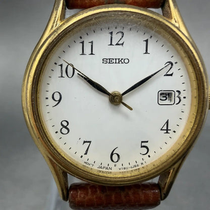 Seiko Watch Women 25mm White Dial Gold Tone Date Round V782-6E50 New Battery1