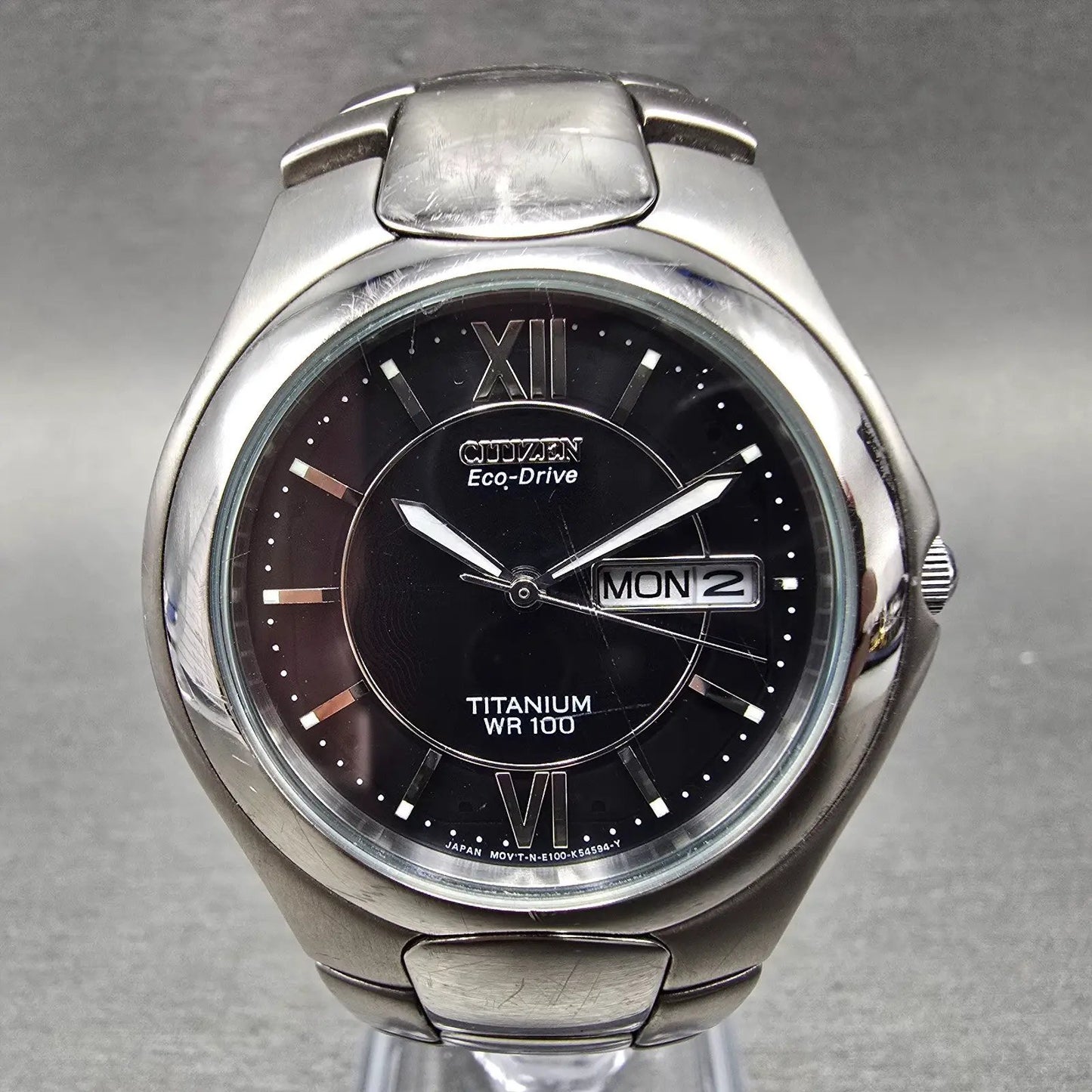 Citizen Eco-Drive Watch Men 37mm Black Dial Titanium Daydate E101-K18434 Runs0