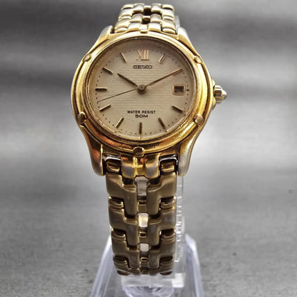Seiko Watch Women 26mm Champagne Dial Gold Tone Date Round 7N82-0599 New Battery5
