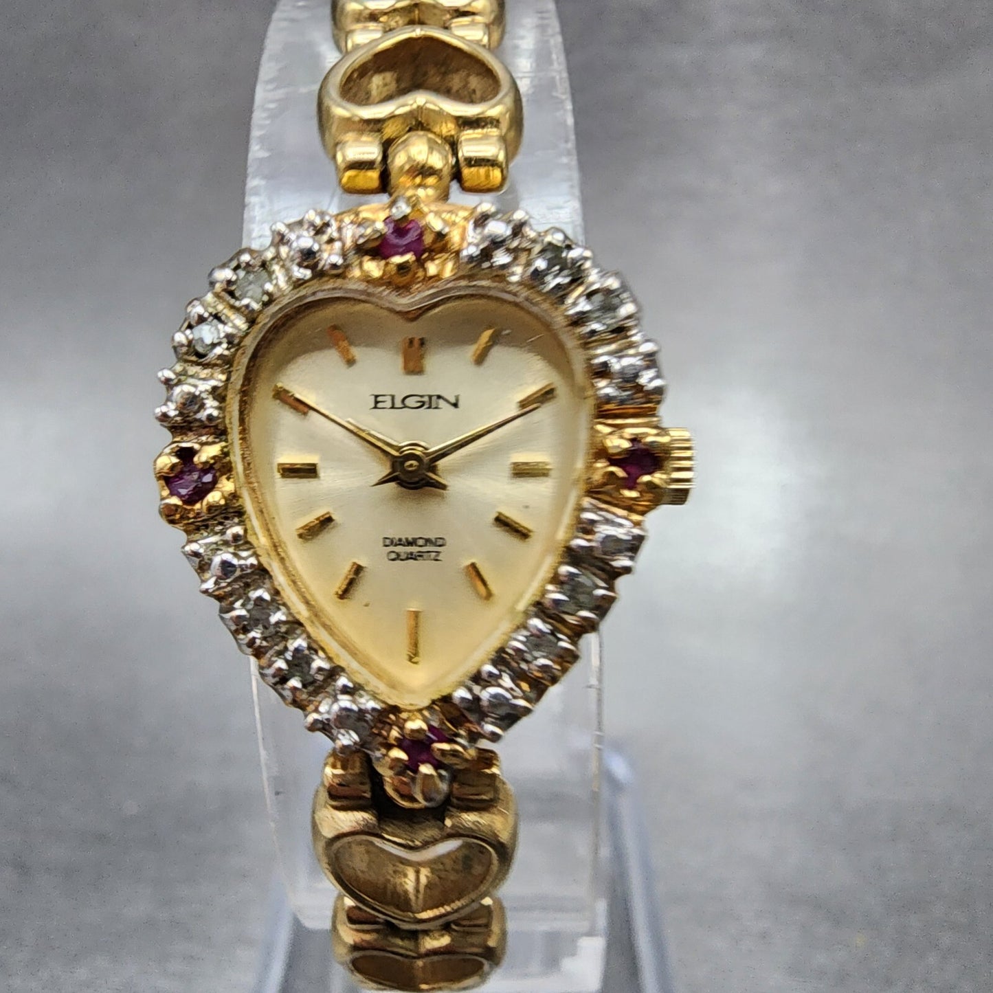 Elgin Heart Watch Women 19mm Champagne Dial Gold Tone Ruby Diamond Bezel New Bat0