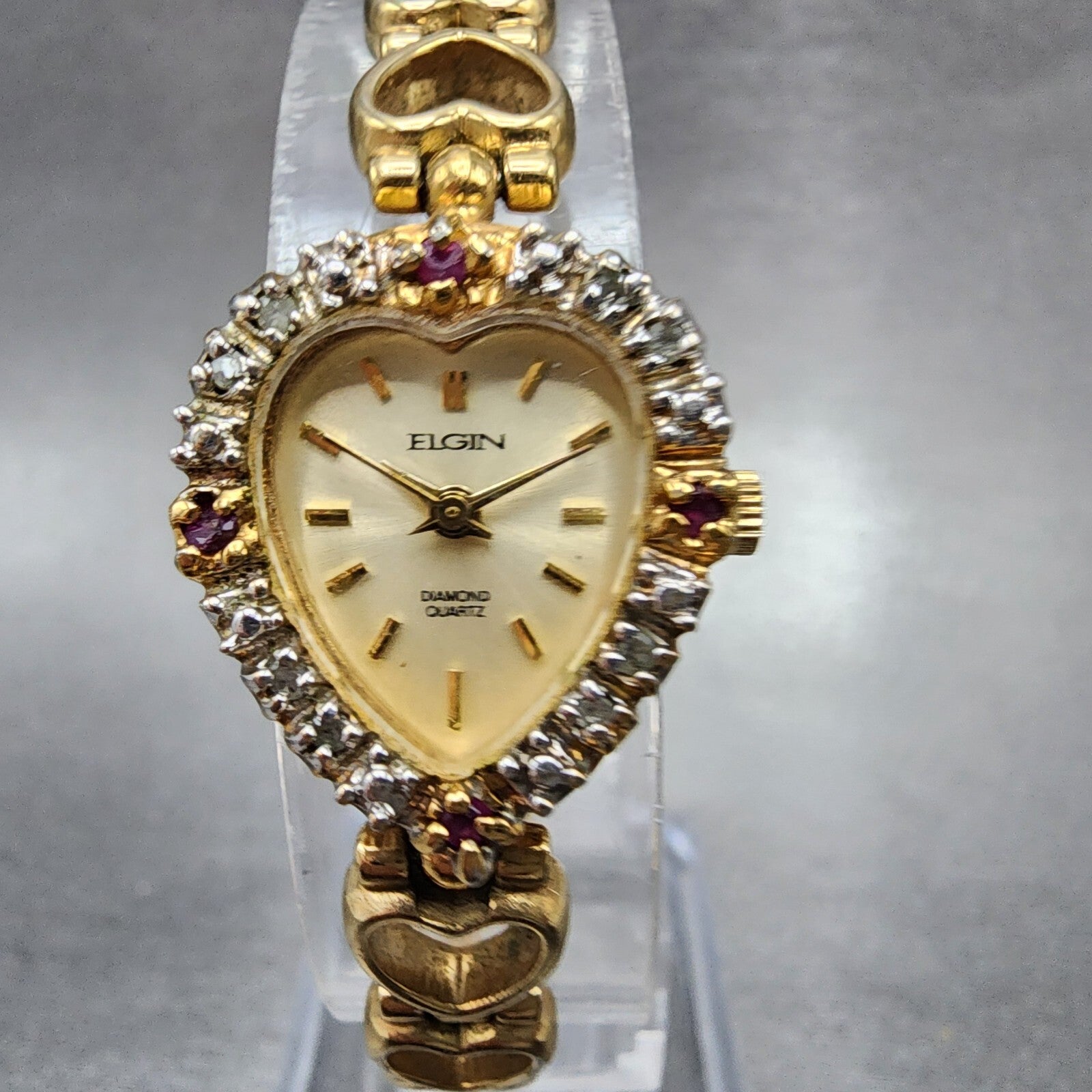 Elgin Heart Watch Women 19mm Champagne Dial Gold Tone Ruby Diamond Bezel New Bat0