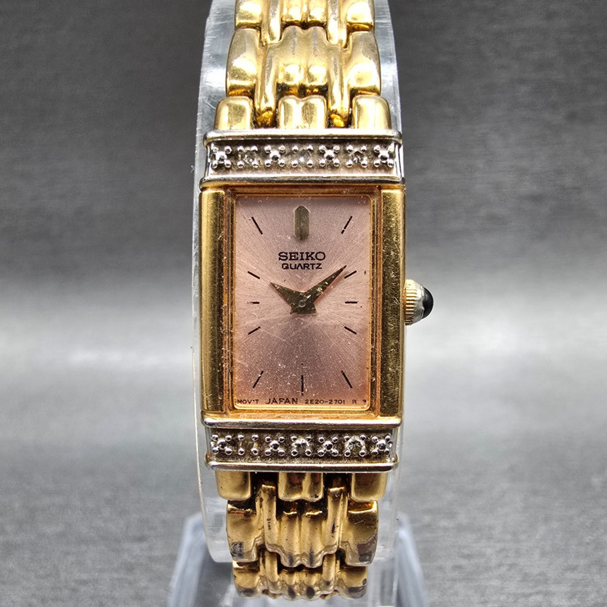 Seiko Watch Women 14mm Pink Dial Gold Tone Gemmed Rectangle 2E20-7191 New Batt0