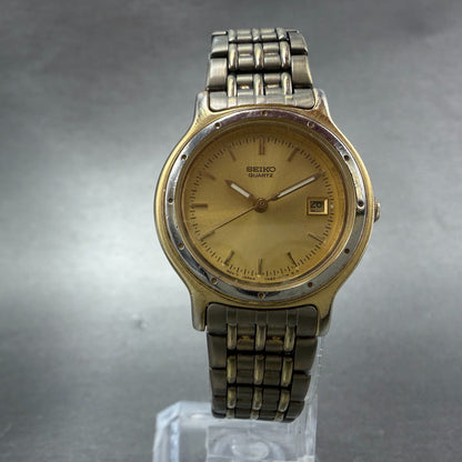 Seiko Watch Women 27mm Champagne Dial Gold Tone Date Round 7N82-0131 New Battery5