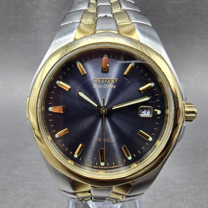 Citizen Eco-Drive Watch Men 35mm Blue Dial Two Tone Date E110-K15699 PARTS0