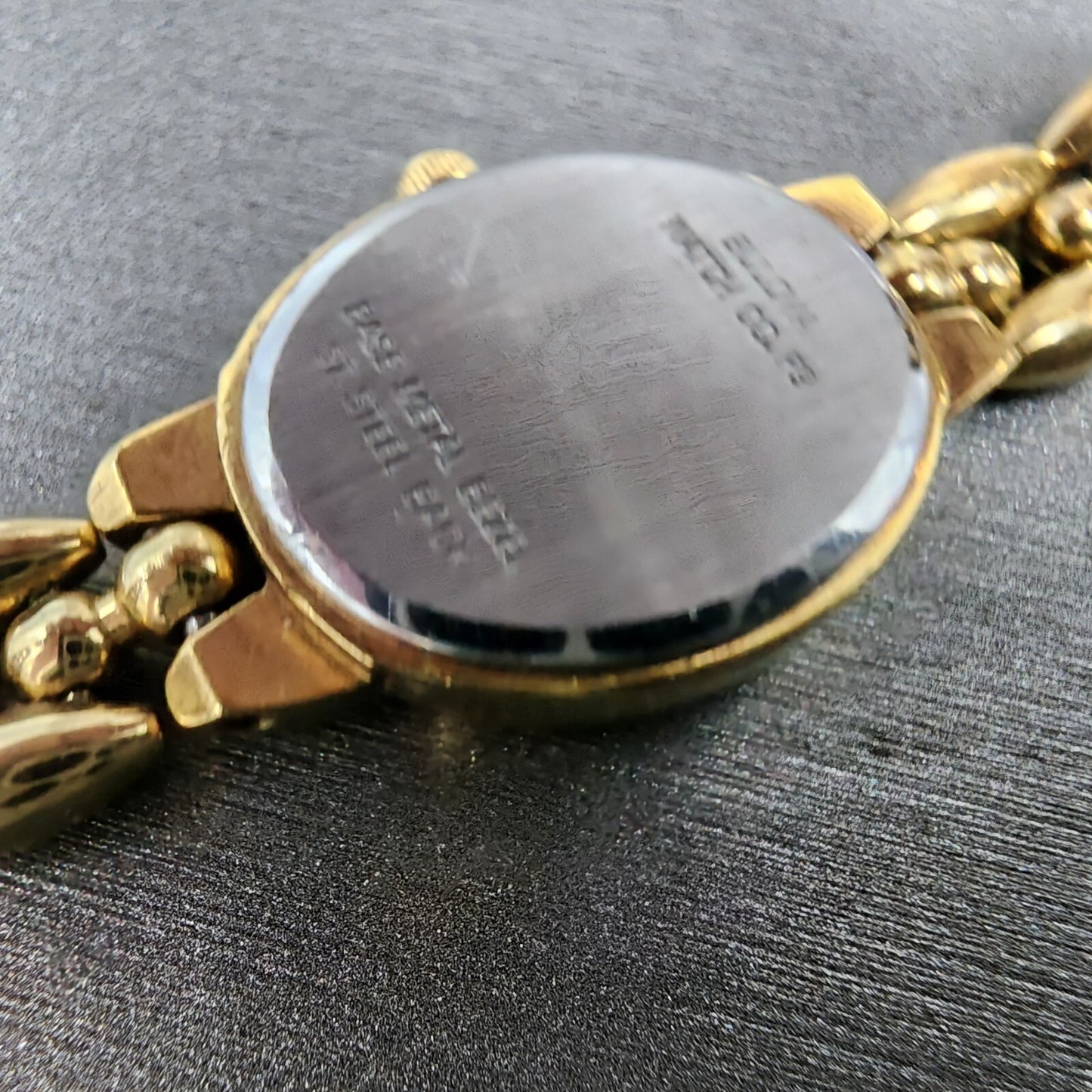 Bulova Watch Women 17mm Champagne Dial Gold Tone Oval 92H51 New Battery9
