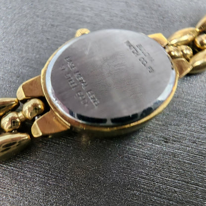 Bulova Watch Women 17mm Champagne Dial Gold Tone Oval 92H51 New Battery9