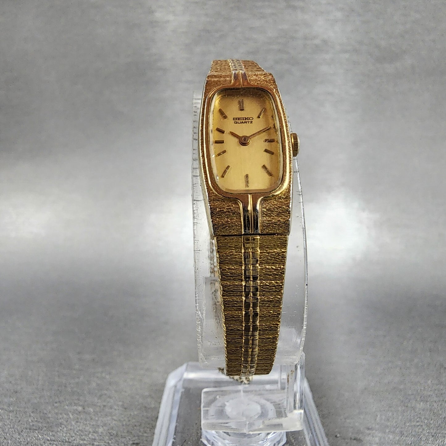Seiko Tank Watch Women 13mm Gold Dial Gold Tone Rectangle 2E206310 New BatteryA5