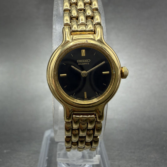Seiko Watch Women 19mm Black Dial Gold Tone Round Vintage 1N00-0C49 New Battery0