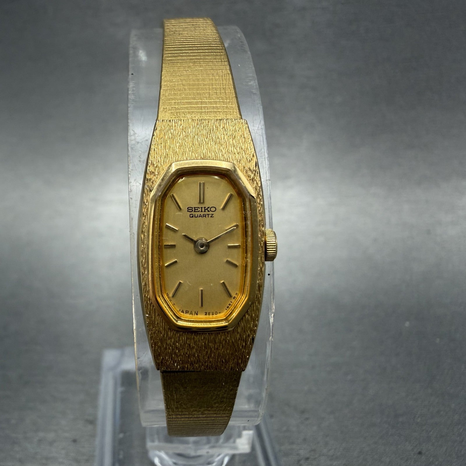 Seiko Watch Women 13mm Champagne Dial Gold Tone Rectangle 2E206461 New Battery0