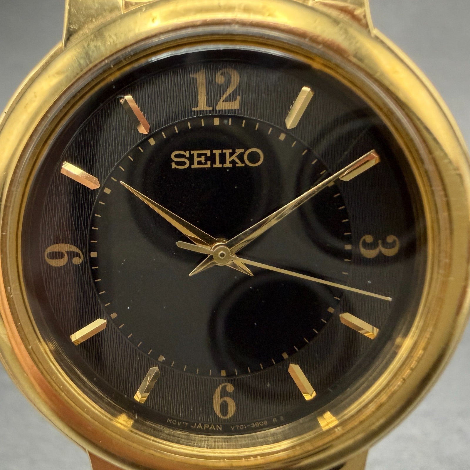 Seiko Watch Men 34mm Black Dial Gold Tone Round V701-2F30 New Battery Vintage1