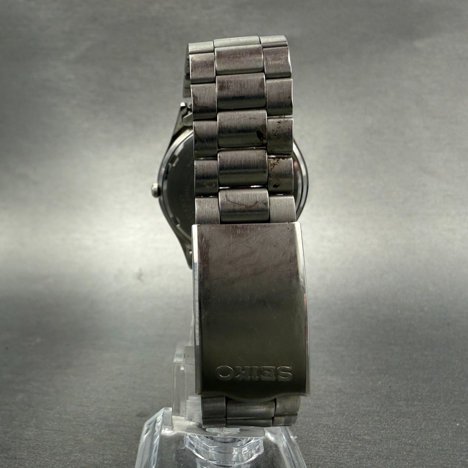 Seiko SQ Watch Men 35mm Silver Dial Silver Tone Date Round 5Y22-8020 New Battery8