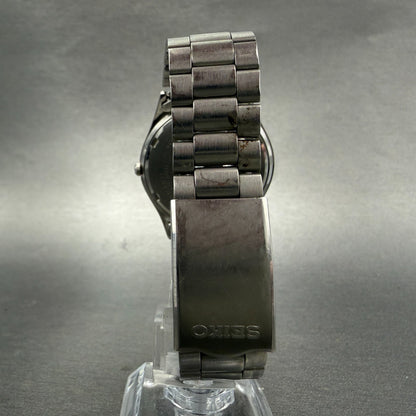 Seiko SQ Watch Men 35mm Silver Dial Silver Tone Date Round 5Y22-8020 New Battery8