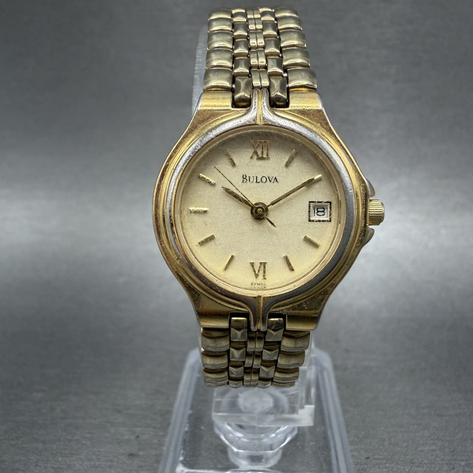 Bulova Watch Women 24mm Champagne Dial Gold Tone Date 97N02 New Battery0