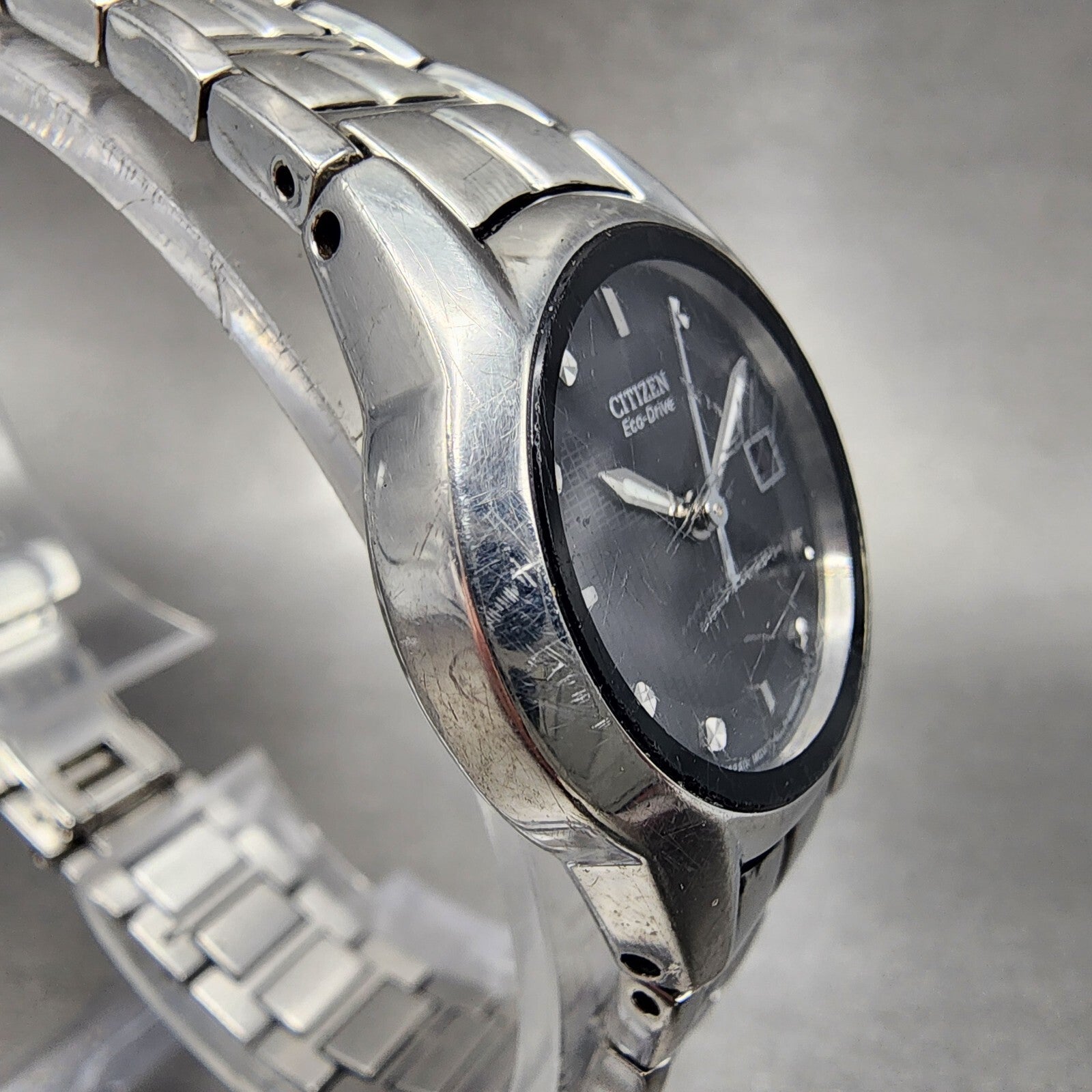 Citizen EcoDrive Watch Women 26mm Black Dial Steel Date Round E011S058503 A233