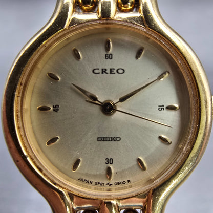 Seiko Creo Watch Women 22mm Champagne Dial Gold Tone Round 2P21-0250 New Battery1