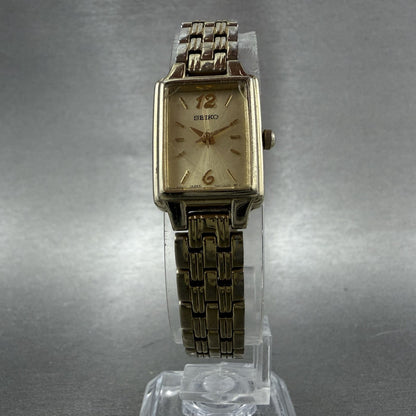 Seiko Tank Watch Women 16mm Champagne Dial Gold Tone Rectangle 1N010FH0 New Bat5