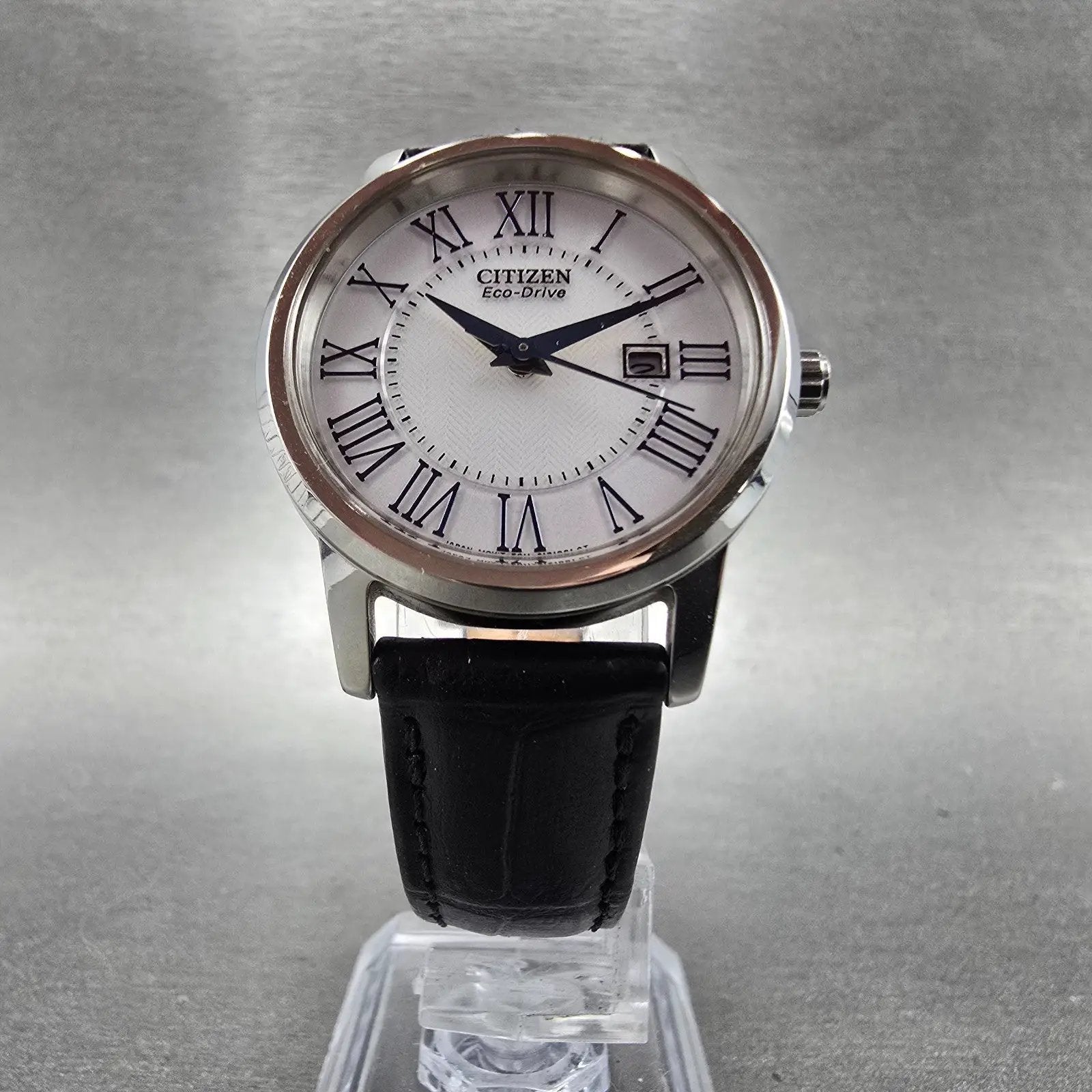 Citizen Eco-Drive Watch Women 30mm White Dial Silver Tone Date E011-S084091 Runs5