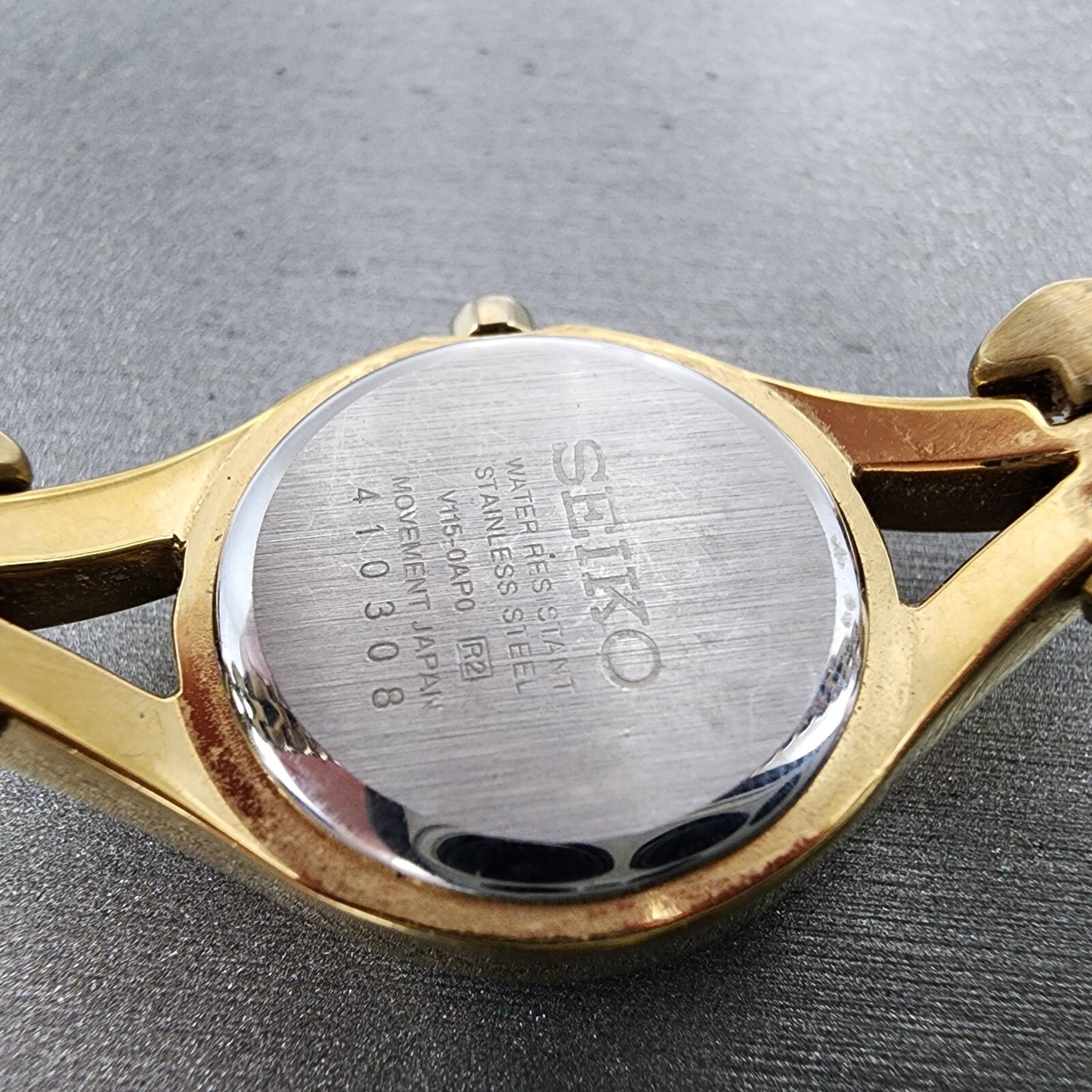 Seiko Solar Watch Women 22mm Champagne Dial Gold Tone Round V1150AP0 Runs9