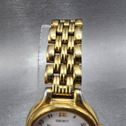 Seiko Watch Women 23mm White Dial Gold Tone Date Round 7N820228 New Battery B124