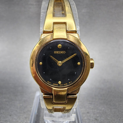 Seiko Watch Women 20mm Black Dial Gold Tone Round 1N000GM0 New Battery0
