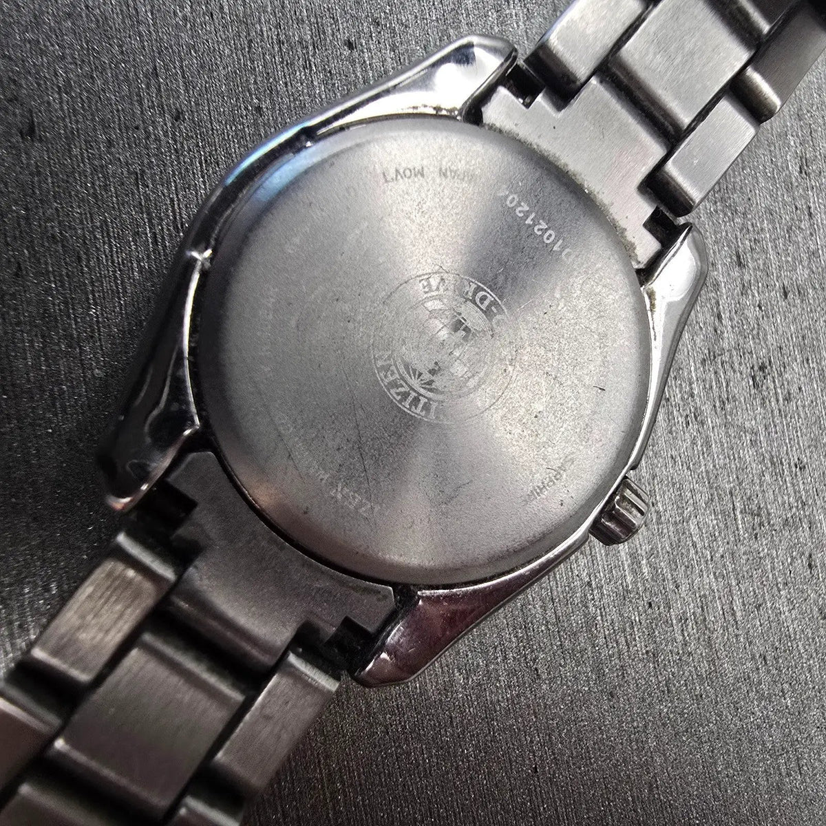 Citizen Eco-Drive Watch Women 27mm Black Dial Titanium Date E011-S068479 Runs10