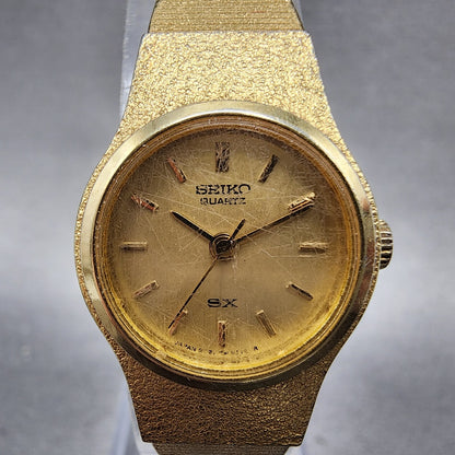 Seiko SX Watch Women 20mm Gold Dial Gold Tone Round 8Y21-0020 New Battery