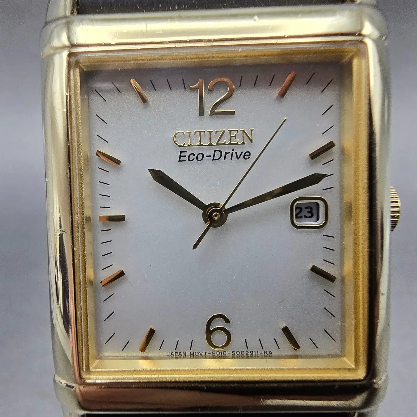 Citizen Eco-Drive Tank Watch Men 25mm Silver Dial Gold Tone Rectangle Date RunsK1