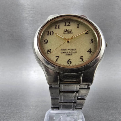 Citizen Q&Q Solar Watch Men 35mm Champagne Dial Silver Tone Round Bracelet Runs6