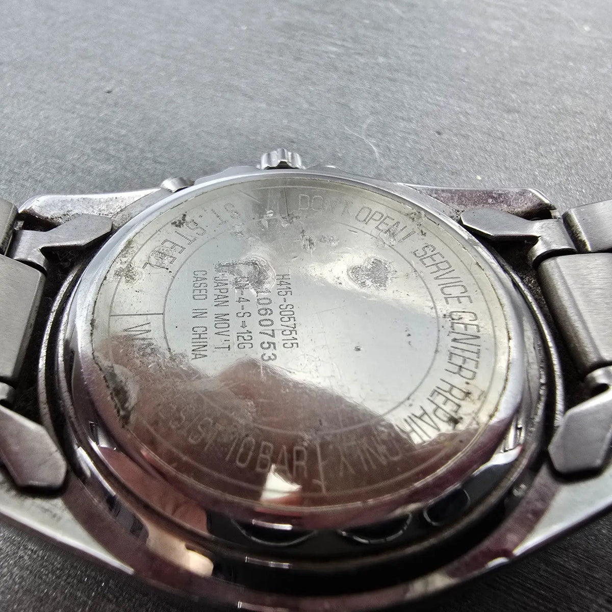Citizen Reguno Watch Men 38mm Black Dial Steel SolarAtomic H415 Round Runs10