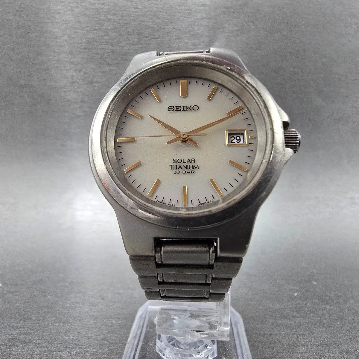 Seiko Solar Watch Men 35mm Gray Dial Titanium Date Round V145-0D60 Runs JDM5