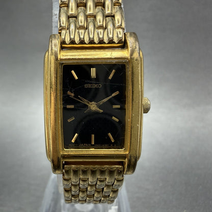 Seiko Tank Watch Women 18mm Black Dial Gold Tone Rectangle V4015650 New Battery1