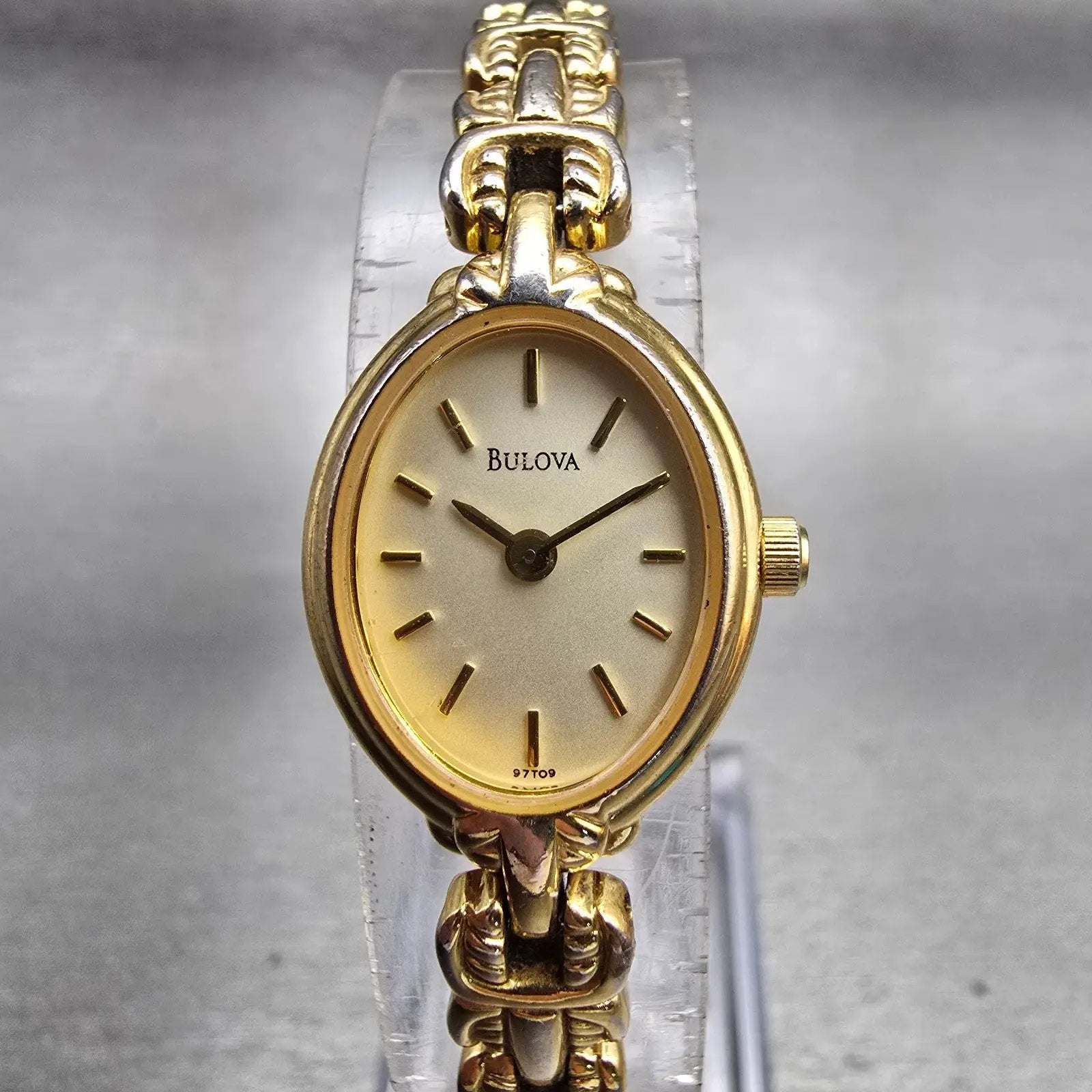 Bulova Watch Women 17mm Champagne Dial Gold Tone Oval 97T09 New Battery0