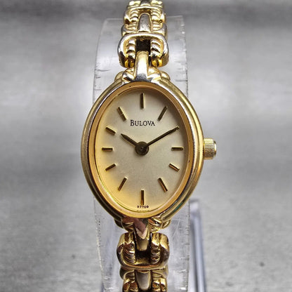 Bulova Watch Women 17mm Champagne Dial Gold Tone Oval 97T09 New Battery0