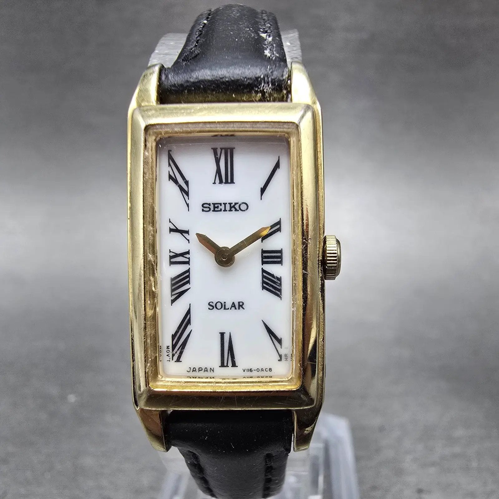 Seiko Solar Tank Watch Women 15mm White Dial Gold Tone Rectangle V116-0AA0 Works0