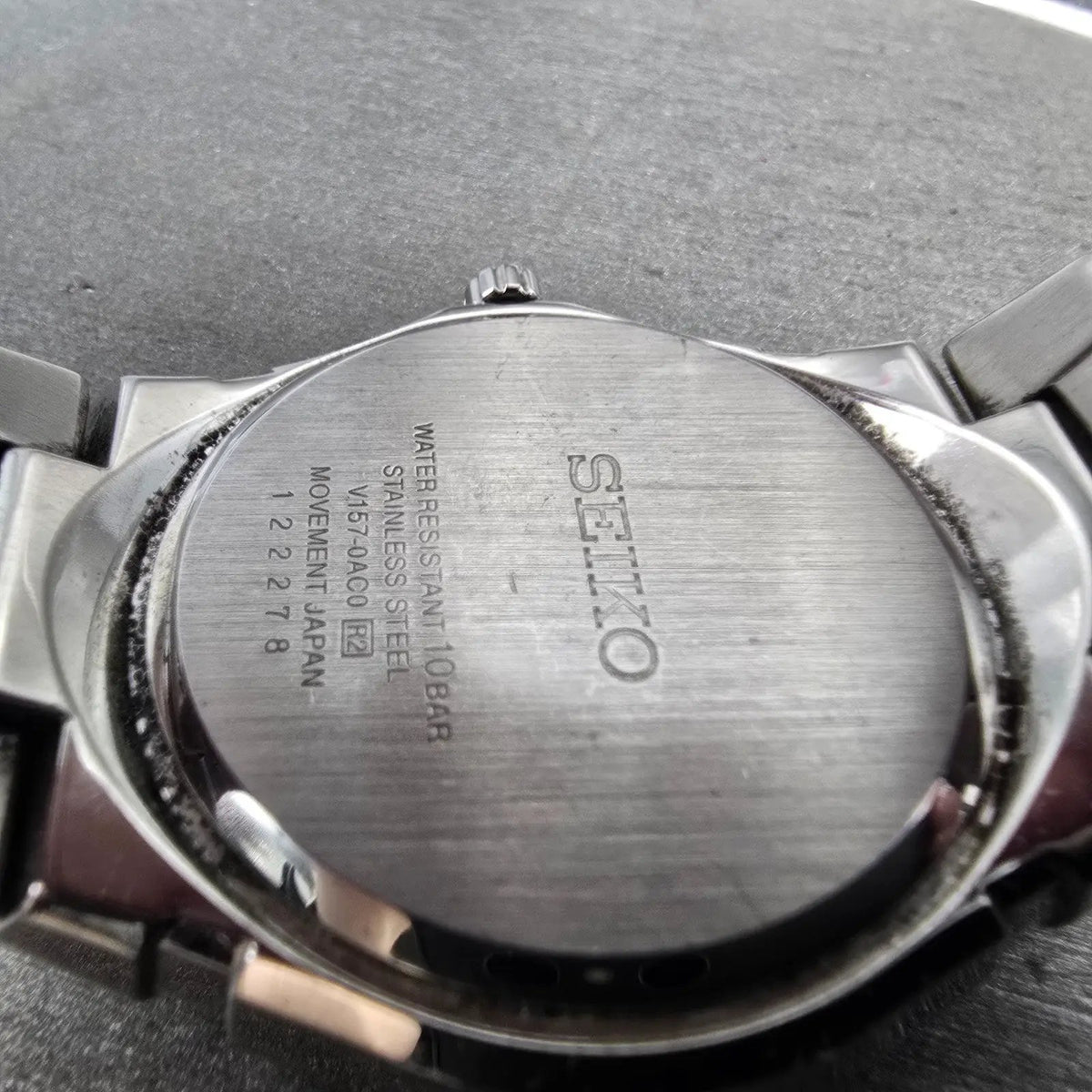Seiko Solar Watch Men 39mm Black Dial Silver Tone Date Round V157-0AC0 Works9
