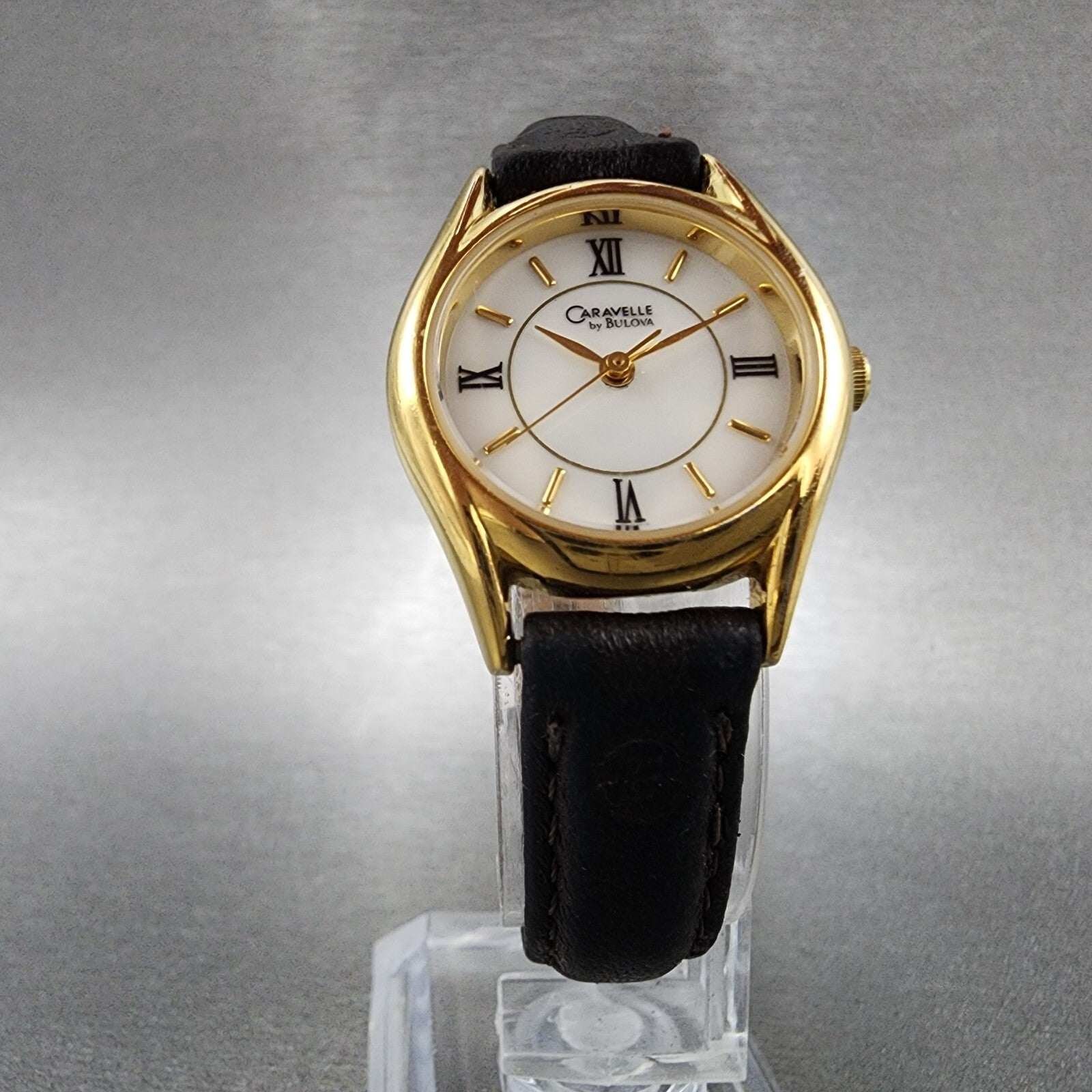 Bulova Caravelle Watch Women 24mm White Dial Gold Tone Round 48E69 New Battery5