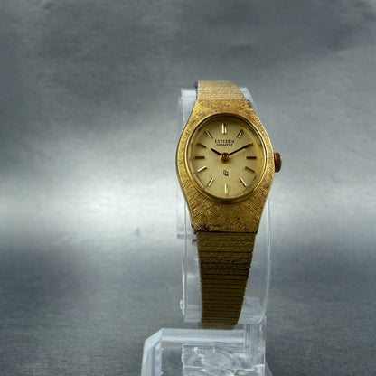 Citizen CQ Watch Women 17mm Champagne Dial Gold Tone Oval 3220-S02287 NewBattery5