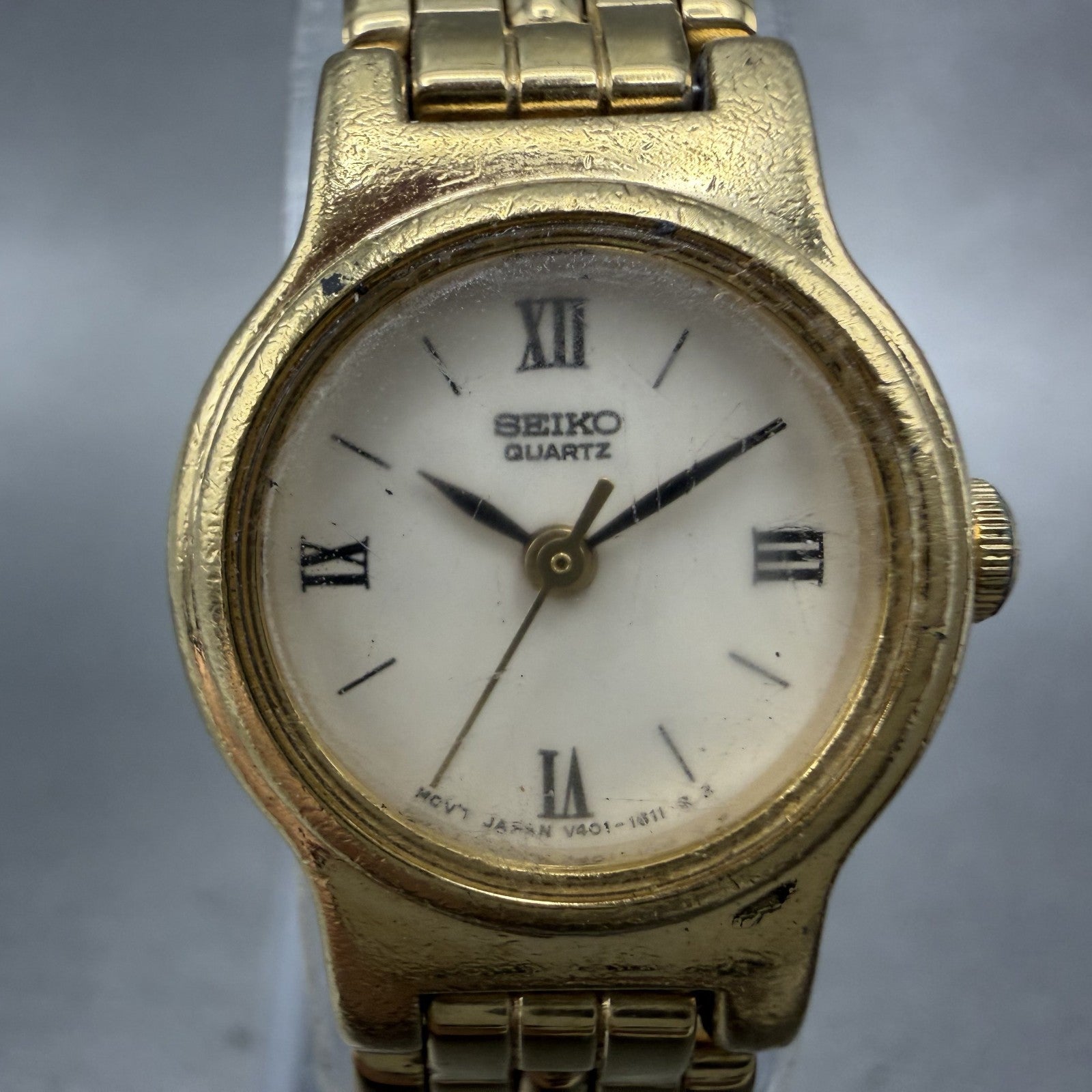 Seiko Watch Women 19mm White Dial Gold Tone Round V4010518 New Battery1