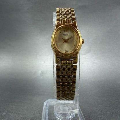 Seiko Watch Women 17mm Champagne Dial Gold Tone Oval V401-5109 New Battery VTG A5