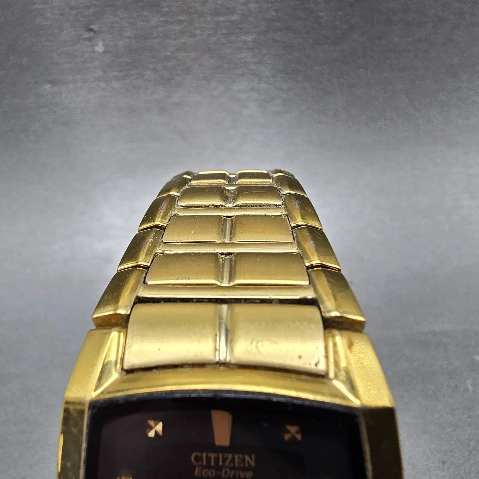 Citizen Eco-Drive Tank Watch Men 31mm Black Dial Gold Date E111-S049369 Runs Jkm5