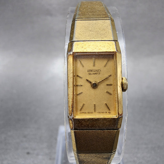 Seiko Tank Watch Women 12mm Champagne Dial Gold Tone 2E205020 New Battery0