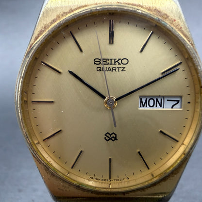 Seiko SQ Watch Men 31mm Champagne Dial Gold Tone Daydate 8223-7099 New Battery51