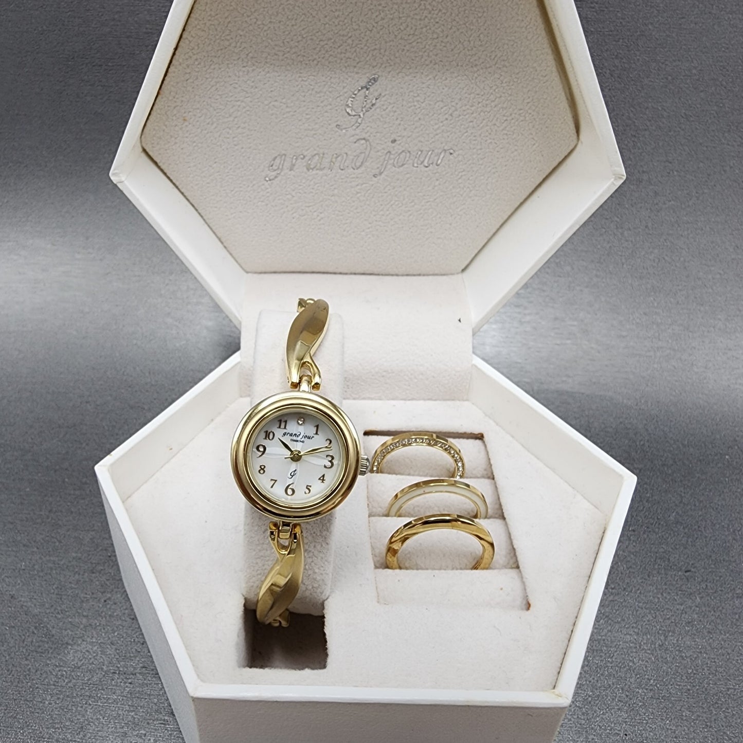 Grand Jour Interchangeable Bezel Watch Women 22mm MOP Dial Gold Tone New Battery0