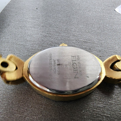 Elgin Watch Women 17mm Champagne Dial Gold Tone Oval EG117 New Battery9