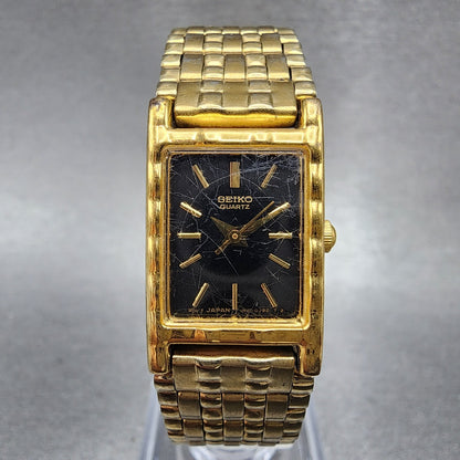 Seiko Tank Watch Women 16mm Black Dial Gold Tone Rectangle 1N015A69 New Battery0